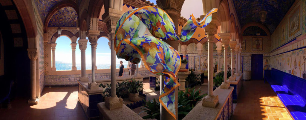 "Malvasía de Sitges" silk scarf in front of the cloister painting inspired by. Museum shop articles